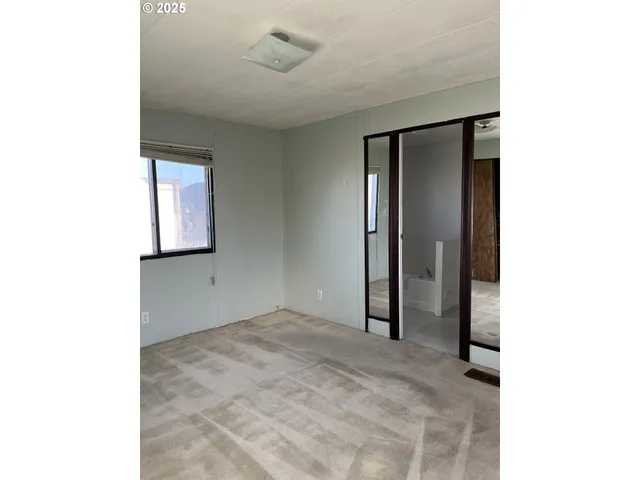 a bathroom with a toilet and a sink