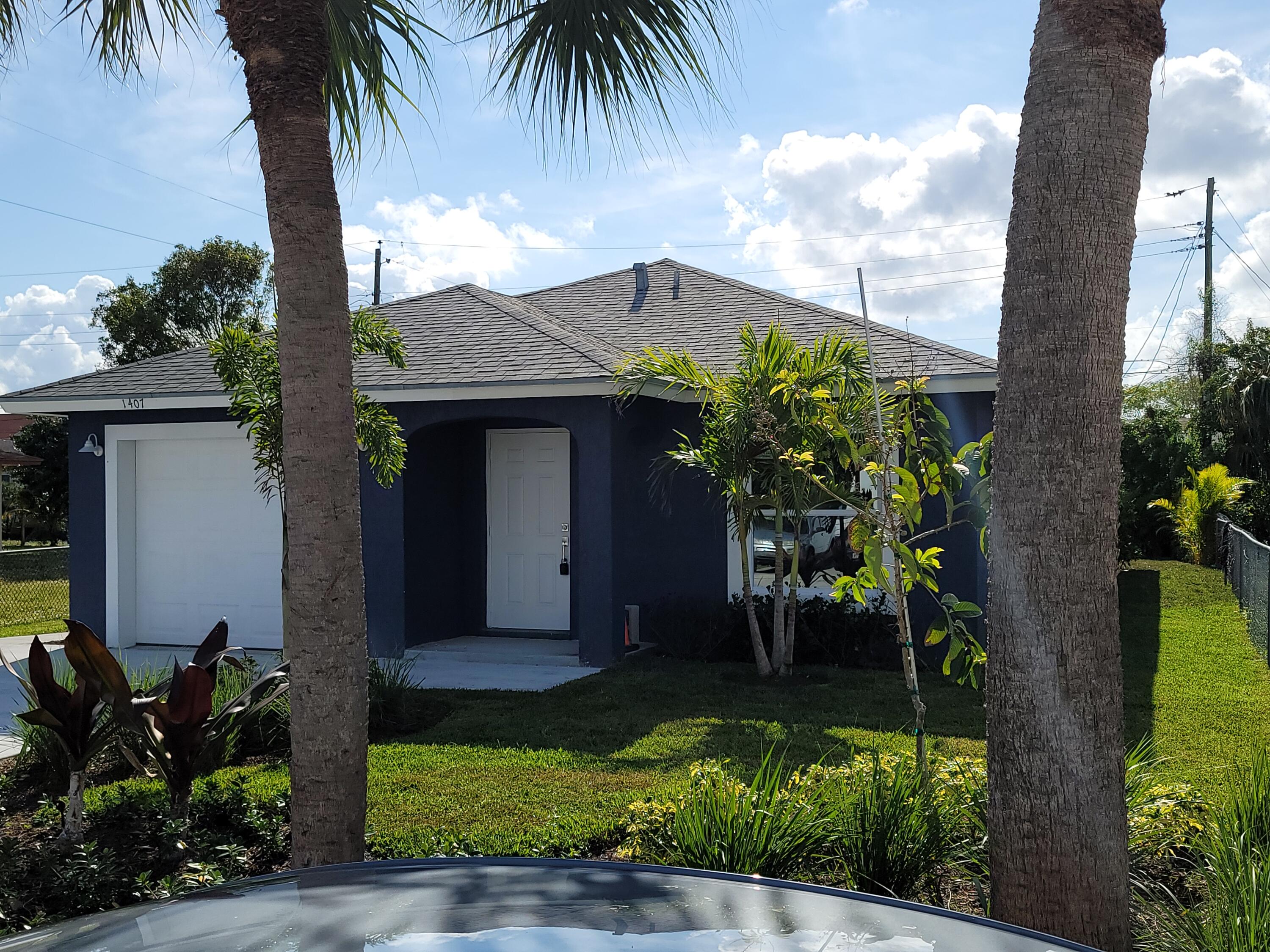 1407 West 32nd Street Riviera Beach, FL 33404 - Photo 2 of 21 20211211_112127