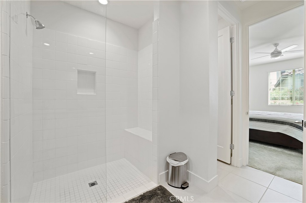 80138 Whisper Rock Way La Quinta, CA 92253 - Photo 18 of 29 a bathroom with a sink a toilet and shower