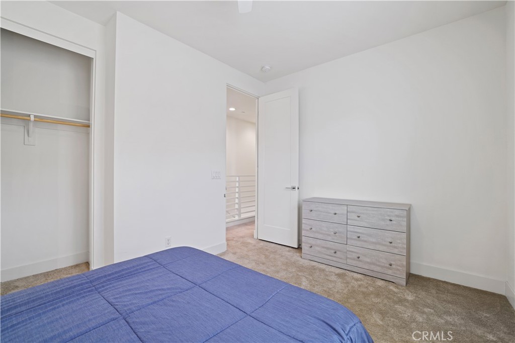 80138 Whisper Rock Way La Quinta, CA 92253 - Photo 23 of 29 a view of room with cabinet and mirror