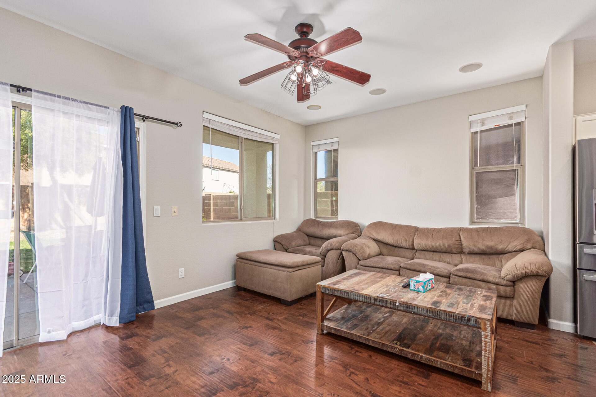 3802 East Chickadee Road Gilbert, AZ 85297 - Photo 6 of 29 a living room with furniture and a window