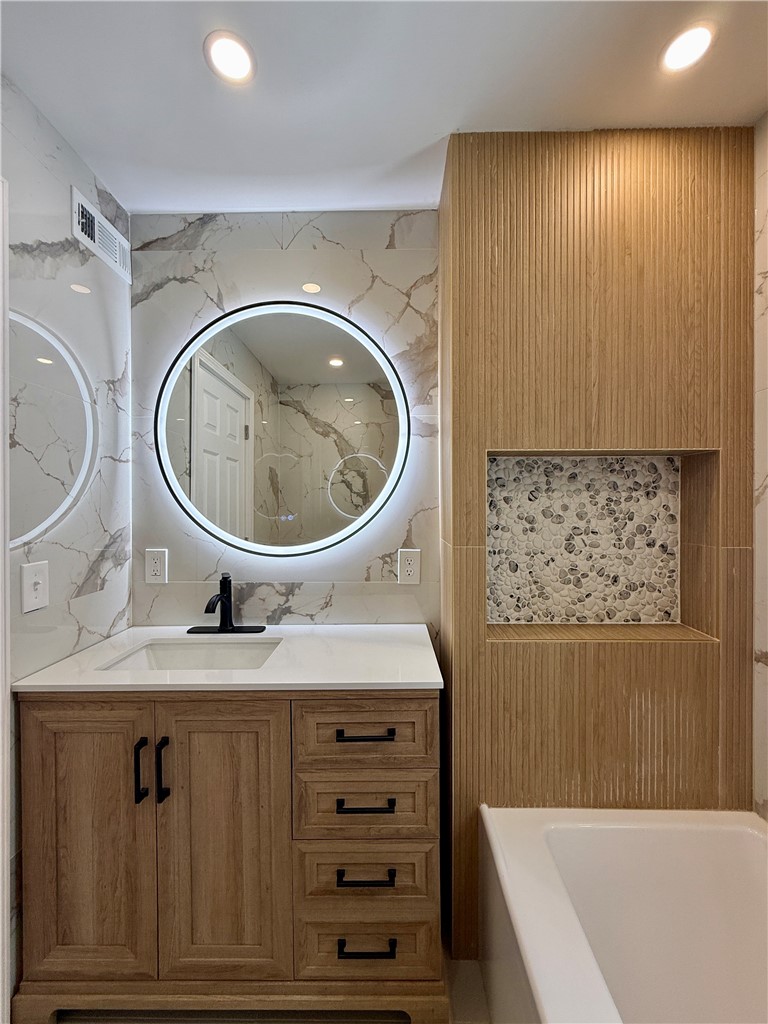 171 Cedarwood Terrace Rochester, NY 14609 - Photo 21 of 29 With another smart mirror.