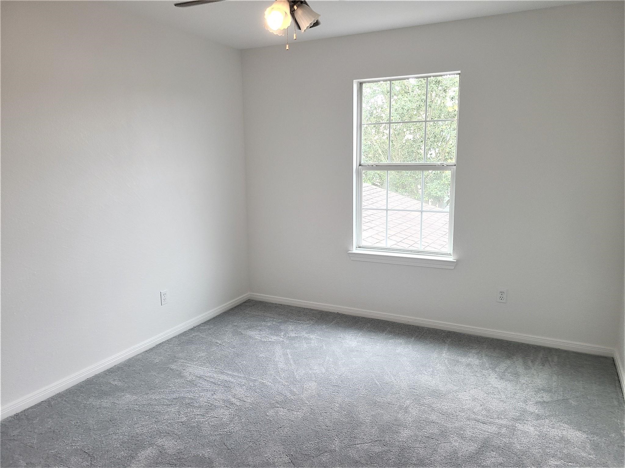 10026 Gil Jr Lane Houston, TX 77075 - Photo 12 of 14 an empty room with a window