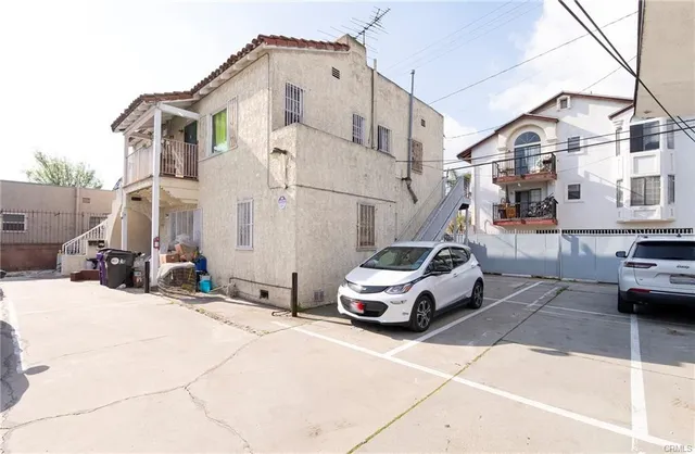 a car parked in front of a house