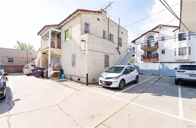a car parked in front of a house