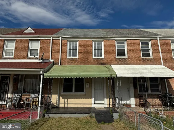 a front view of a house with a porch