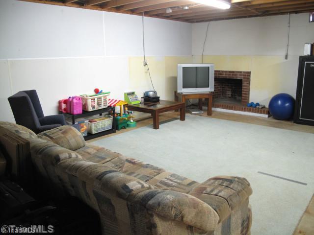 220 Milling Road Mocksville, NC 27028 - Photo 14 of 14 Playroom. Basement entertainment