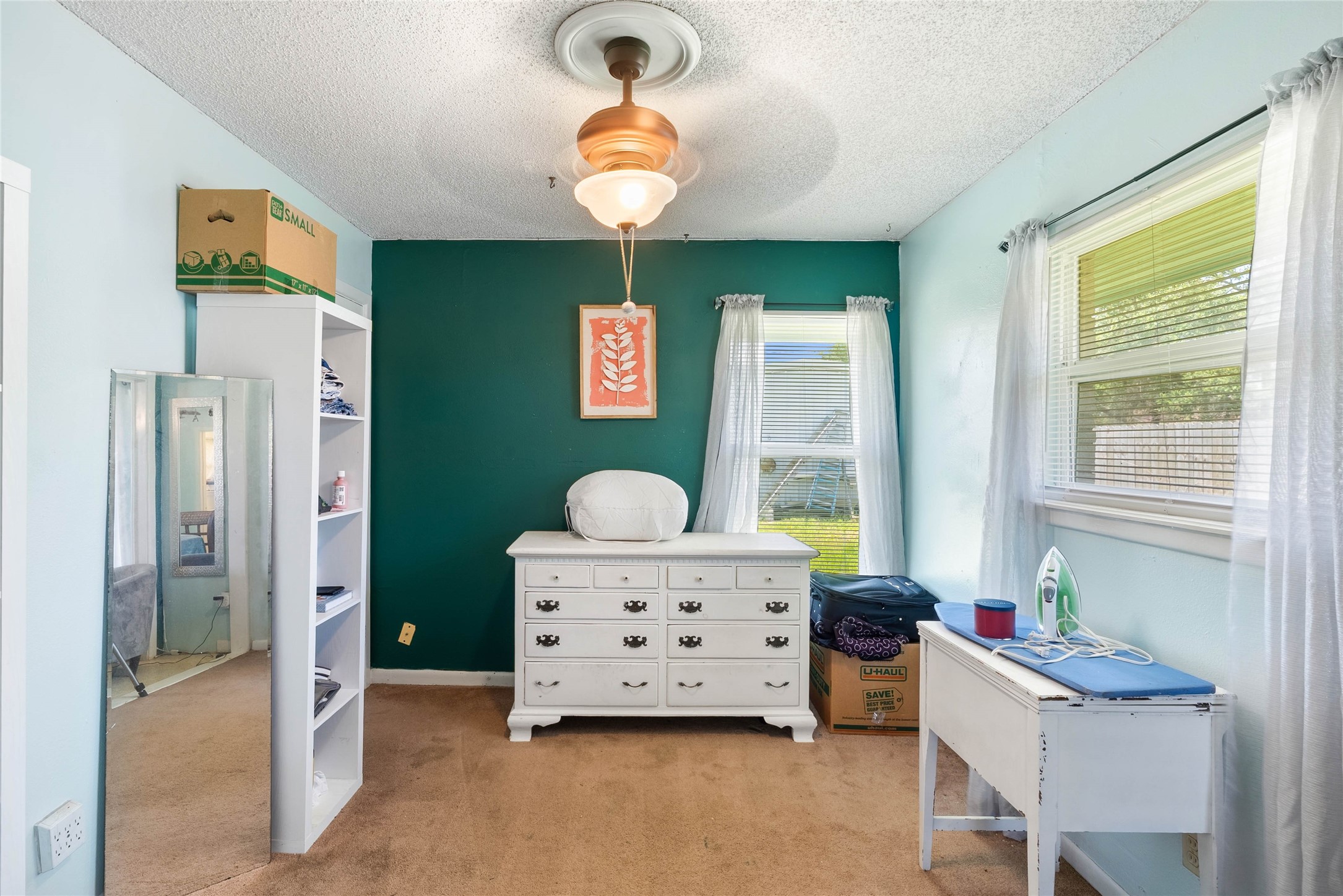 168 Sunset Ingleside, TX 78362 - Photo 17 of 26 Charming additional bedroom featuring a bright window and plenty of space for furniture layouts.