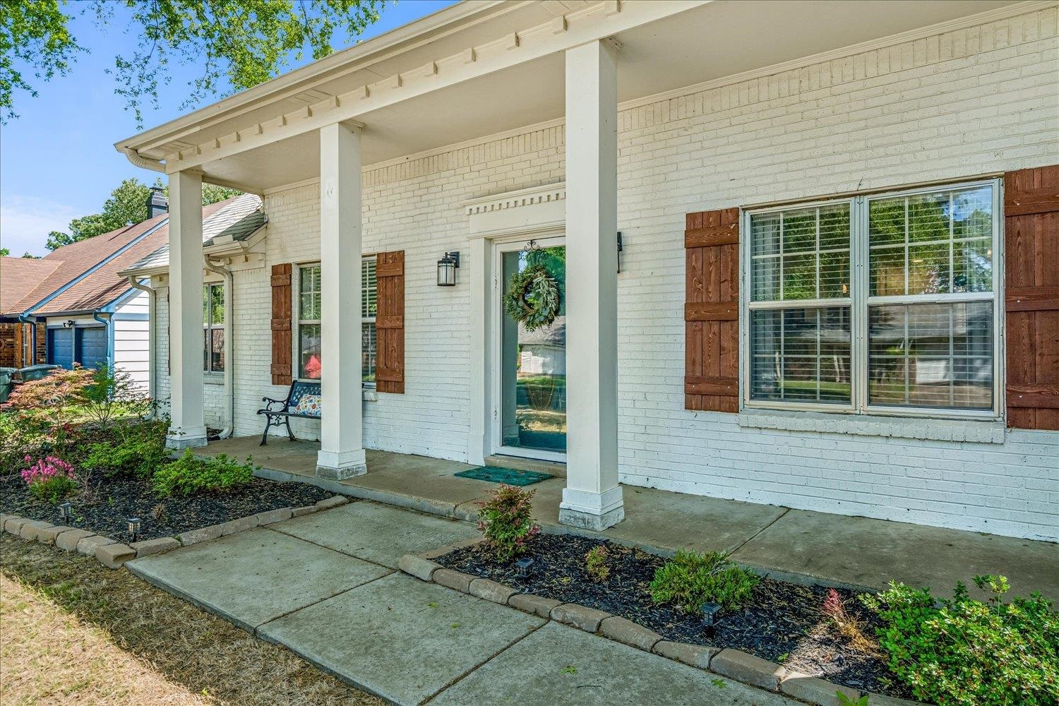 2944 Charles Bryan Road Bartlett, TN 38134 - Photo 2 of 36 a front view of a house with a yard