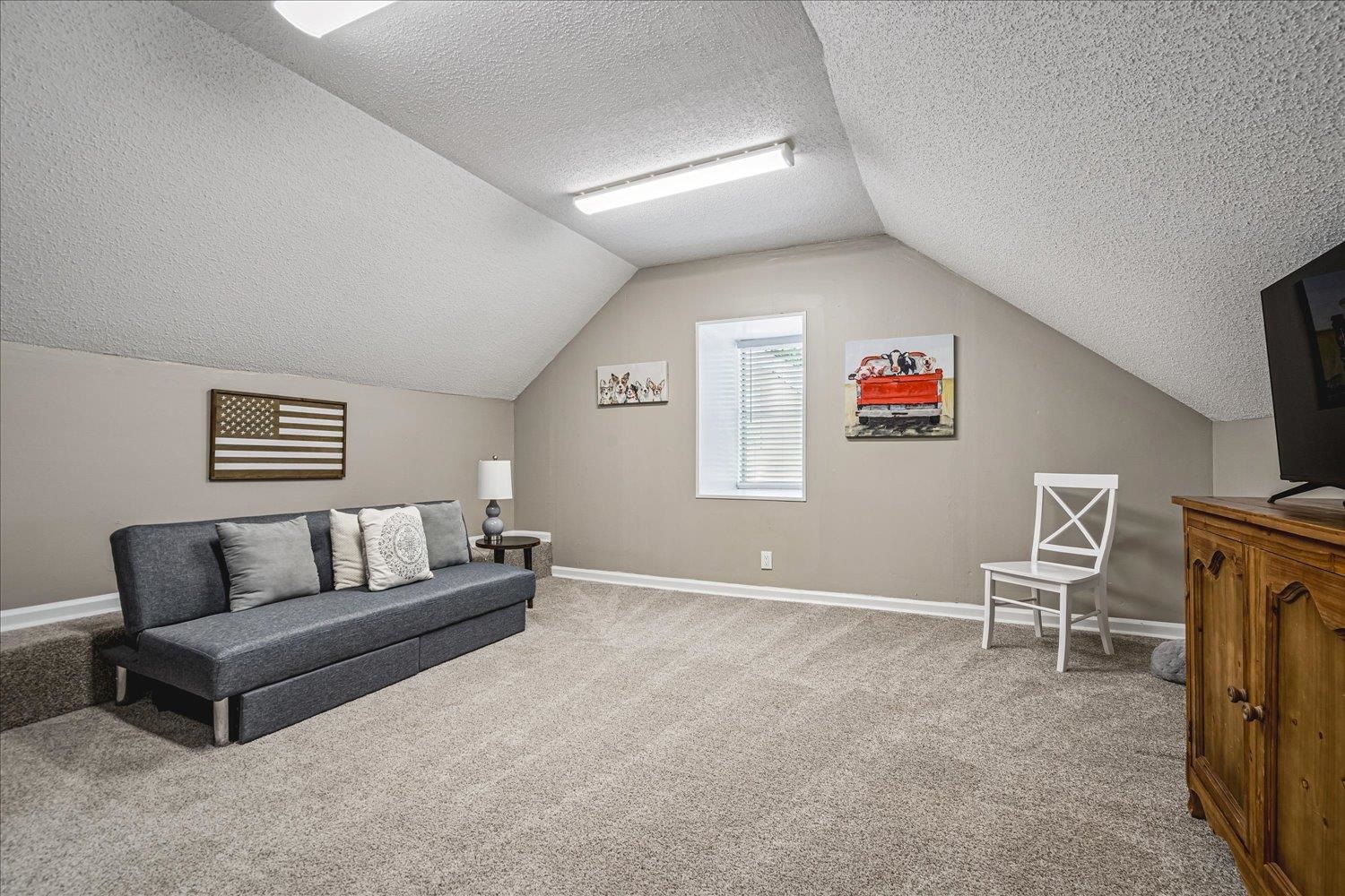 2944 Charles Bryan Road Bartlett, TN 38134 - Photo 25 of 36 a living room with furniture and a window