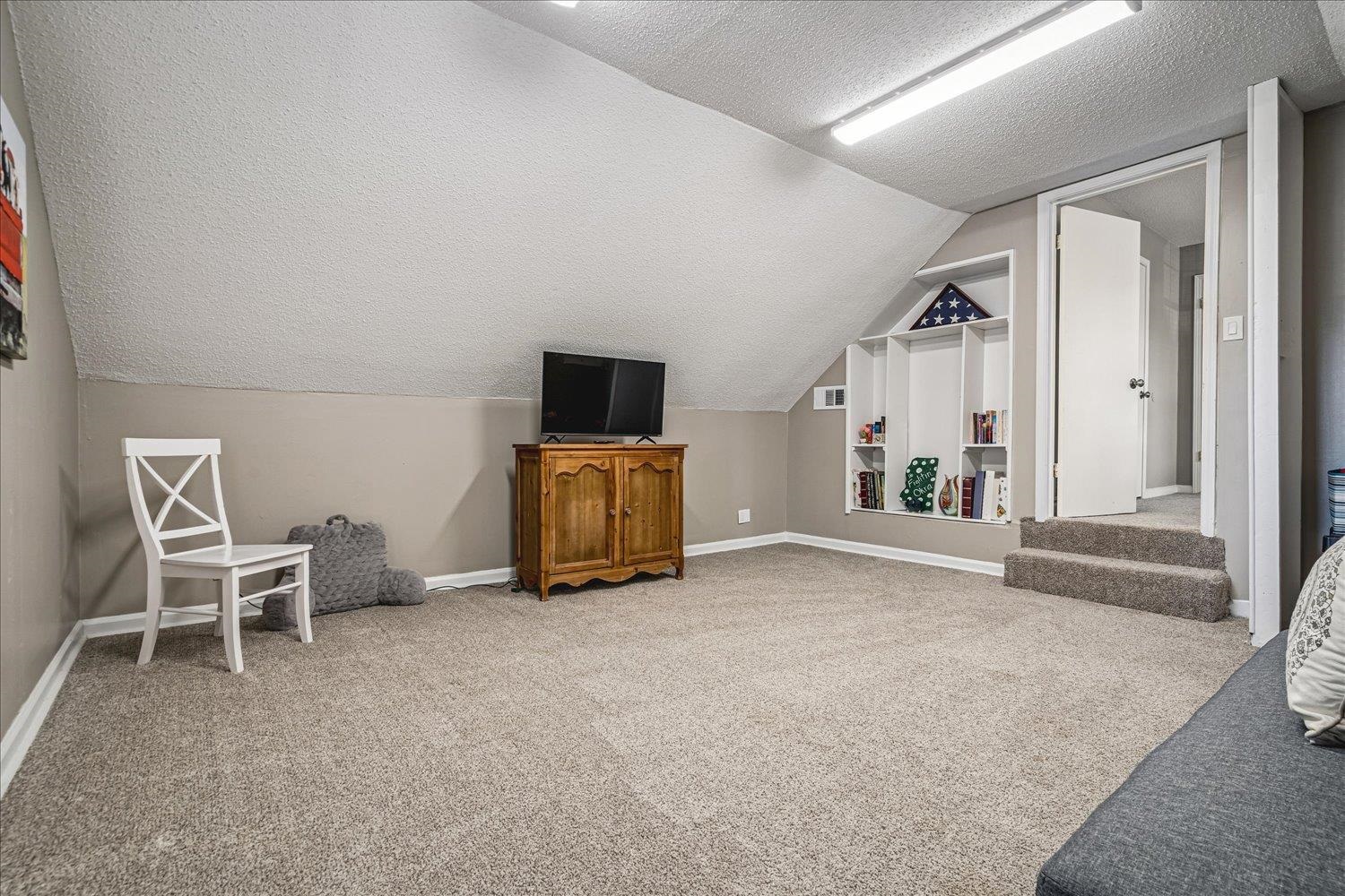 2944 Charles Bryan Road Bartlett, TN 38134 - Photo 26 of 36 a view of livingroom with furniture and flat screen tv
