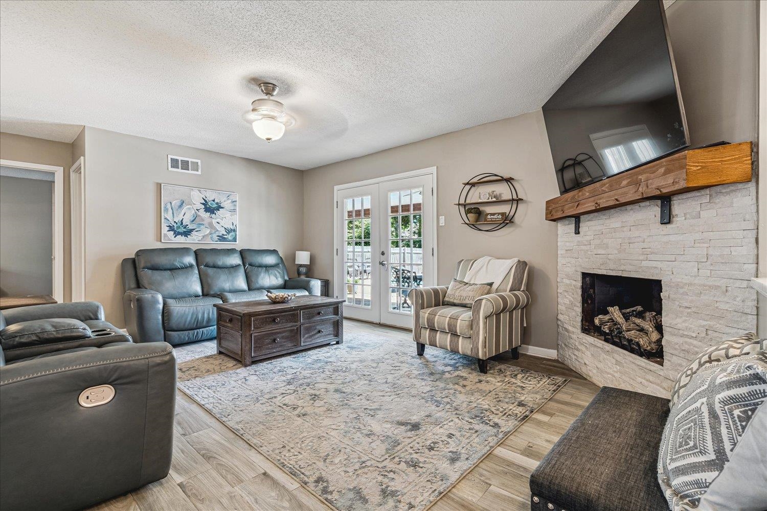 2944 Charles Bryan Road Bartlett, TN 38134 - Photo 35 of 36 a living room with furniture and a fireplace
