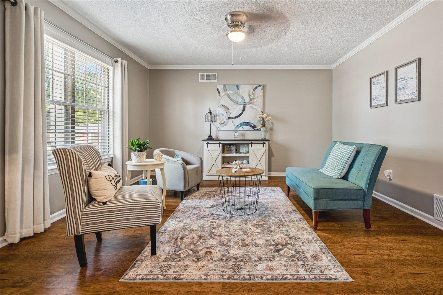 2944 Charles Bryan Road Bartlett, TN 38134 - Photo 4 of 36 a living room with furniture and a rug