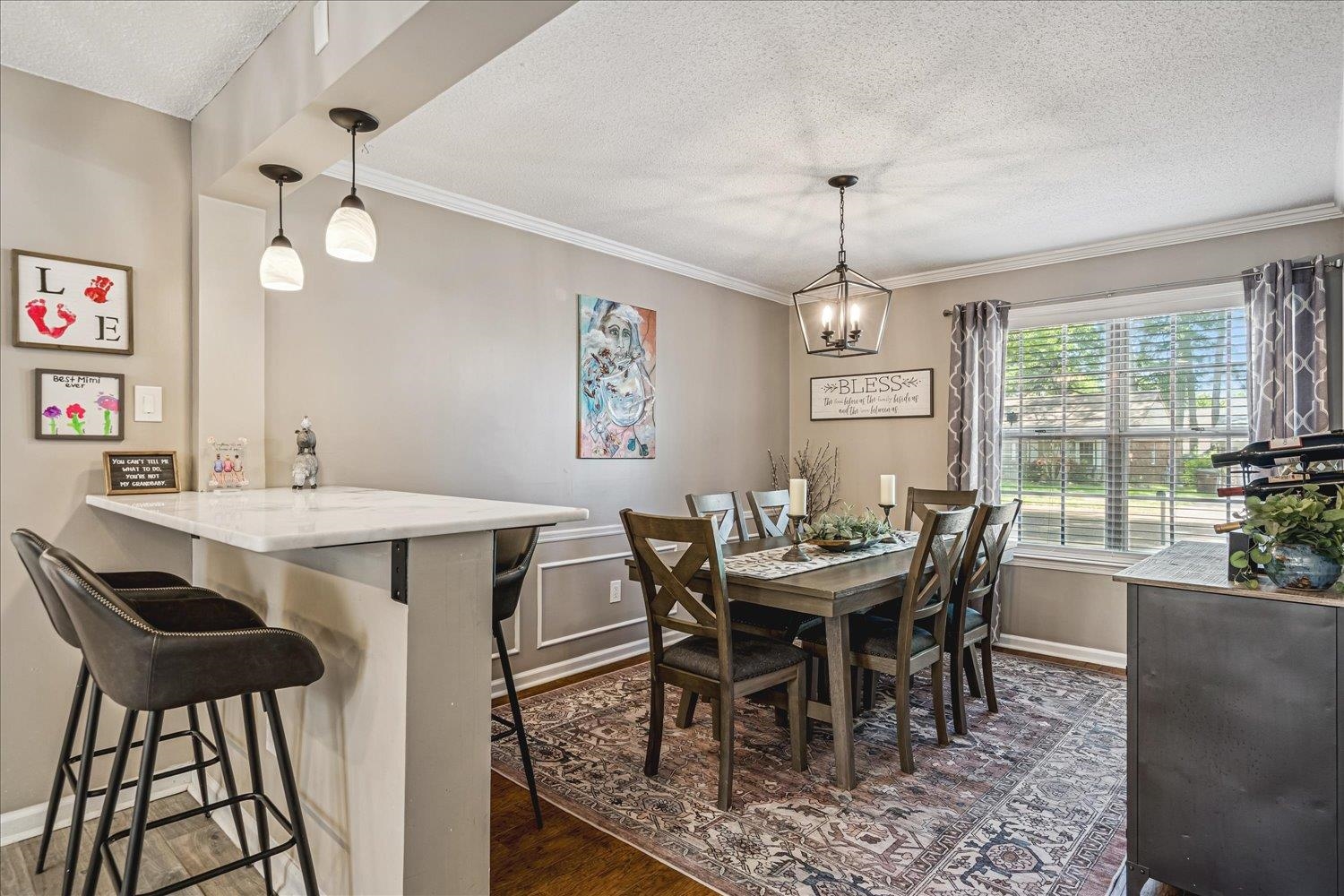 2944 Charles Bryan Road Bartlett, TN 38134 - Photo 10 of 36 a view of a dining room with furniture window and wooden floor