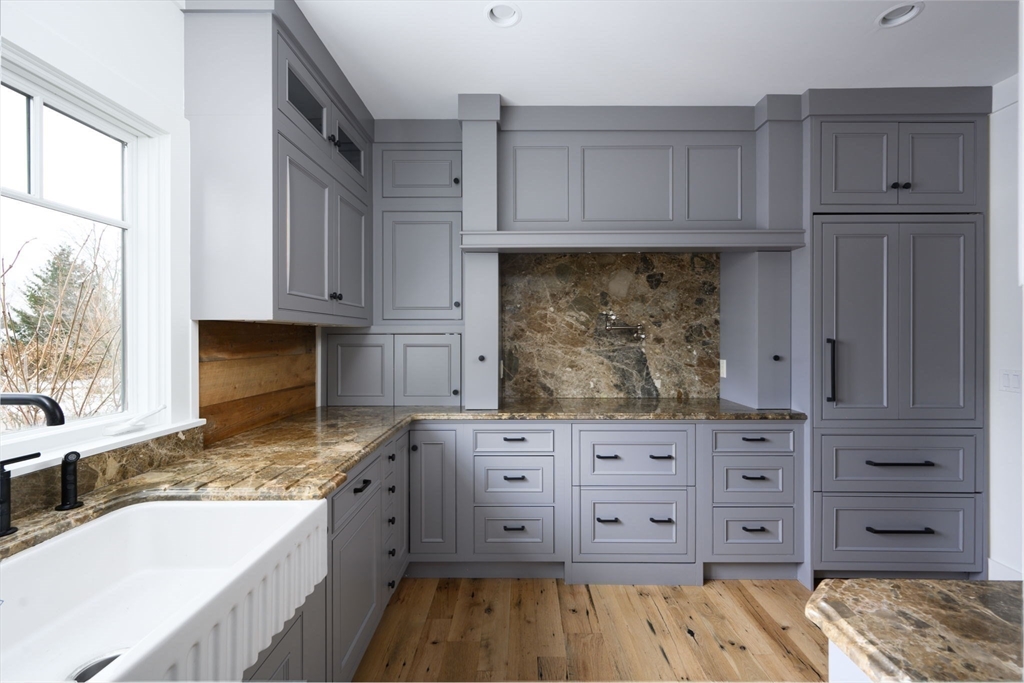 9 Tillinghast Drive Hingham, MA 02043 - Photo 16 of 39 a kitchen with stainless steel appliances granite countertop a refrigerator and window