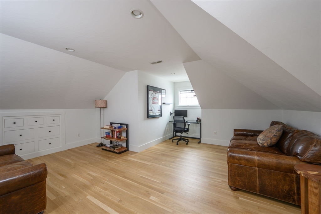 9 Tillinghast Drive Hingham, MA 02043 - Photo 24 of 39 a living room with furniture and a wooden floor