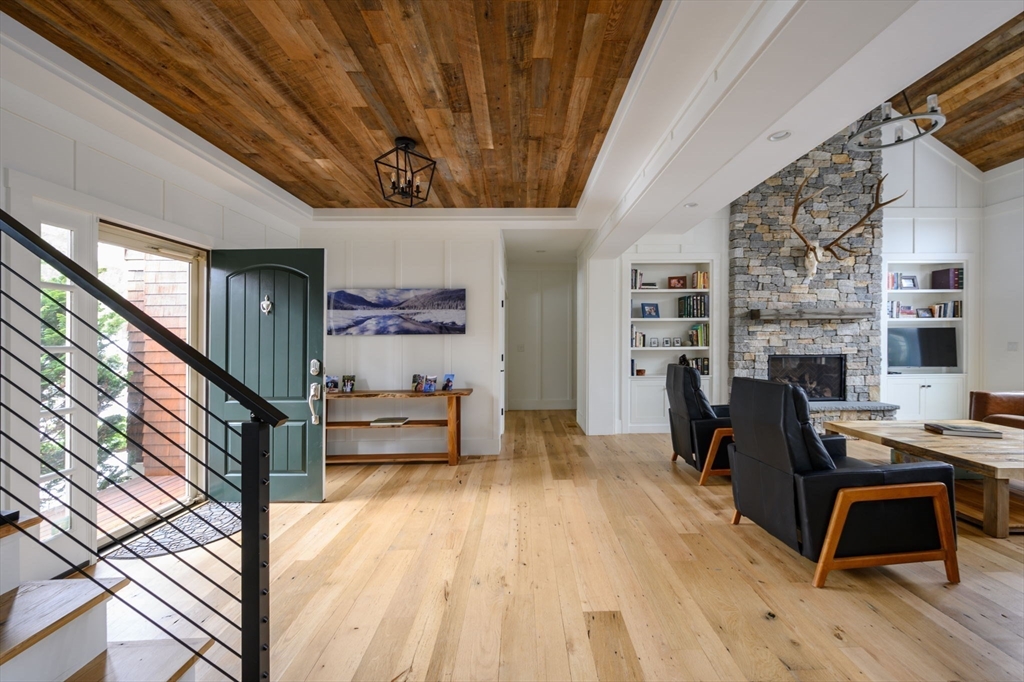 9 Tillinghast Drive Hingham, MA 02043 - Photo 3 of 39 a view of a livingroom with furniture and a workspace