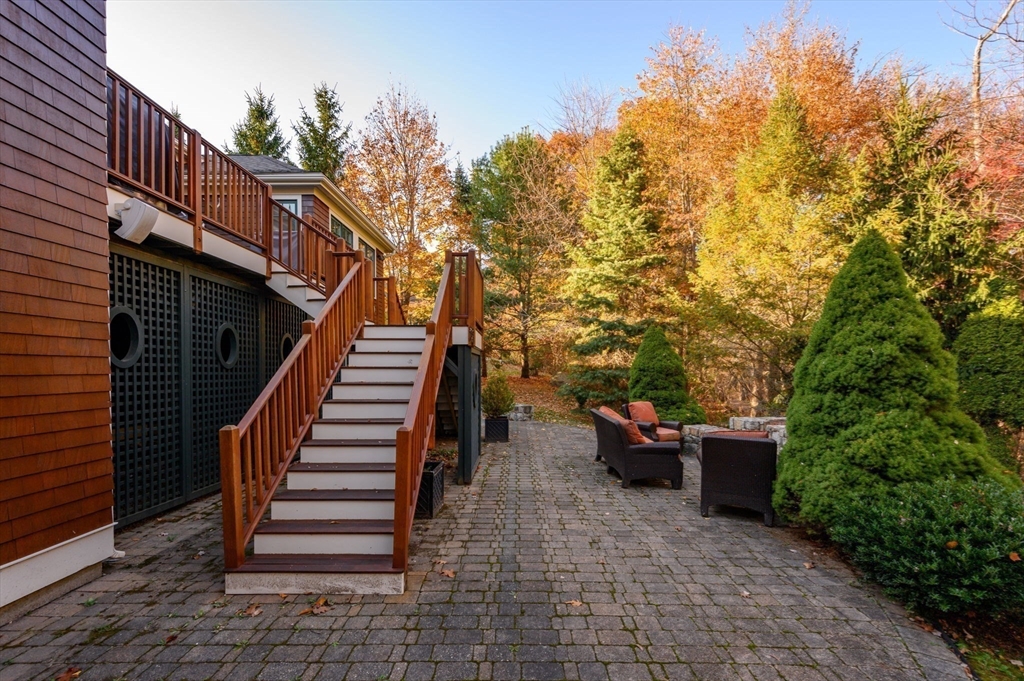 9 Tillinghast Drive Hingham, MA 02043 - Photo 35 of 39 a view of a patio with furniture and trees
