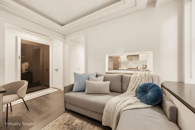 a living room with furniture and a couch