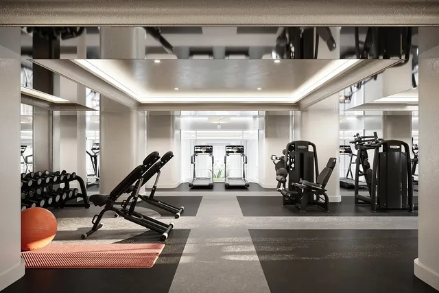 a living room with furniture and a lamp