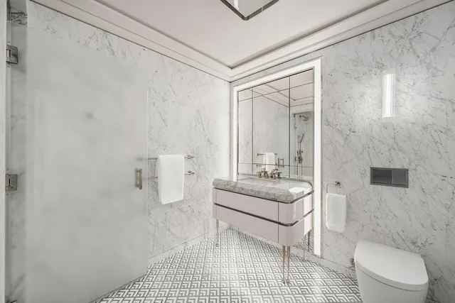 a kitchen with stainless steel appliances granite countertop a sink and a stove