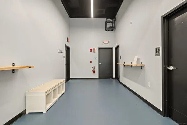 a view of a hallway with closet