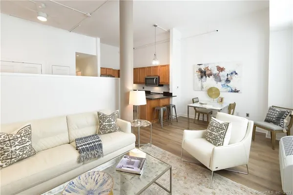 a living room with furniture and a couch