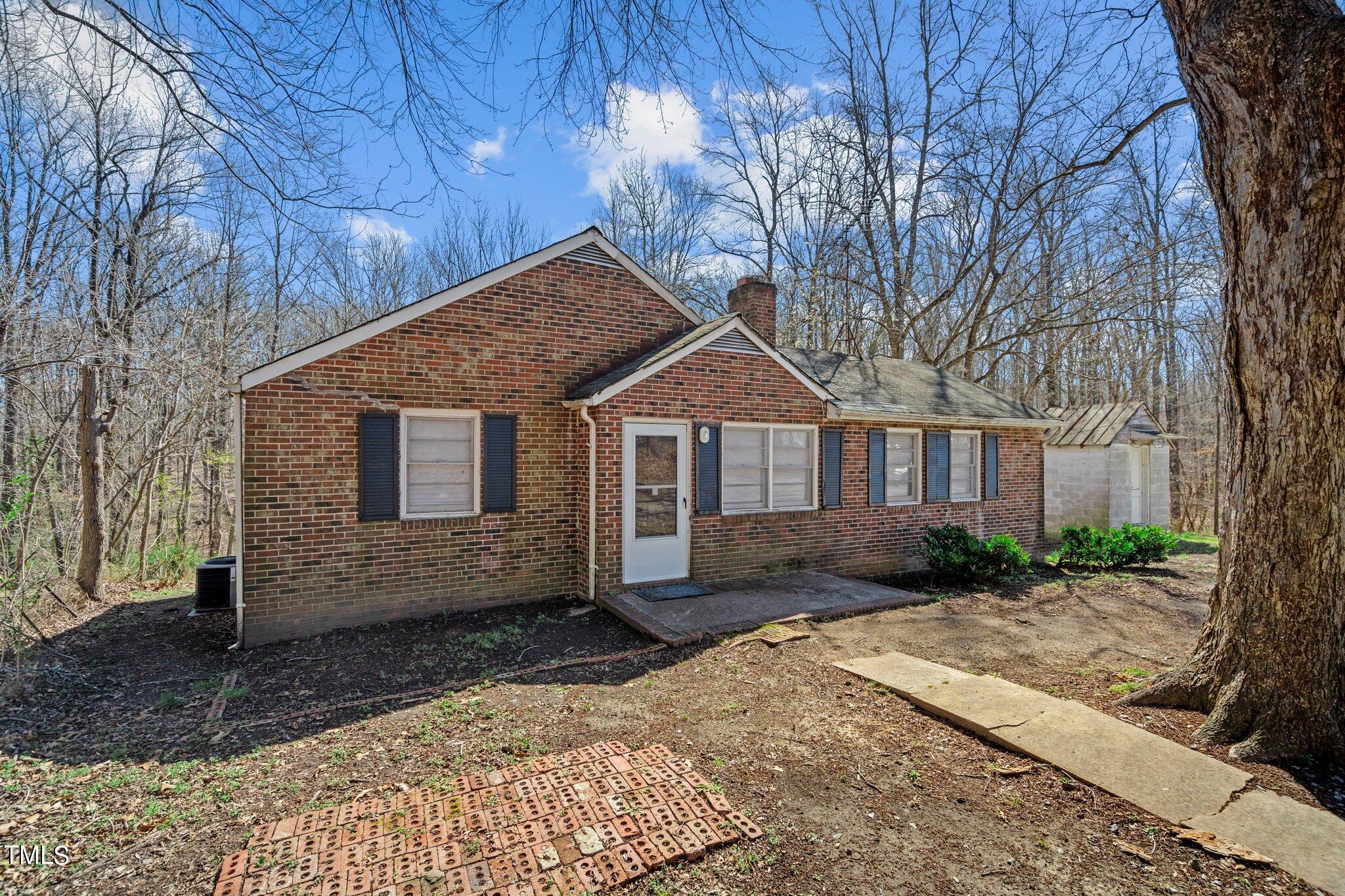 223 Gentry Street Roxboro, NC 27573 - Photo 1 of 36 a view of a house with a yard