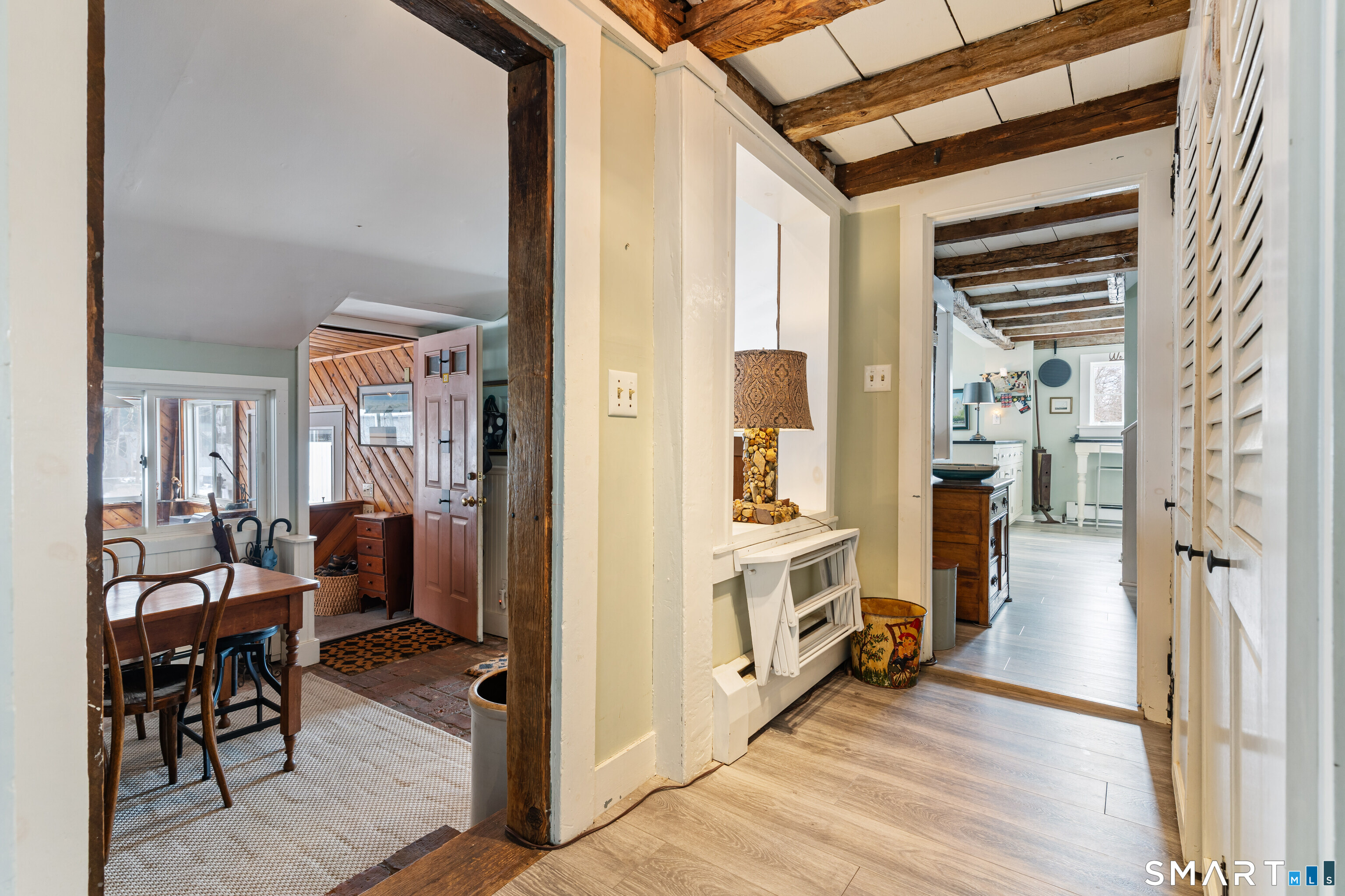 147 Boston Street Guilford, CT 06437 - Photo 17 of 32 a view of a livingroom with furniture and front door