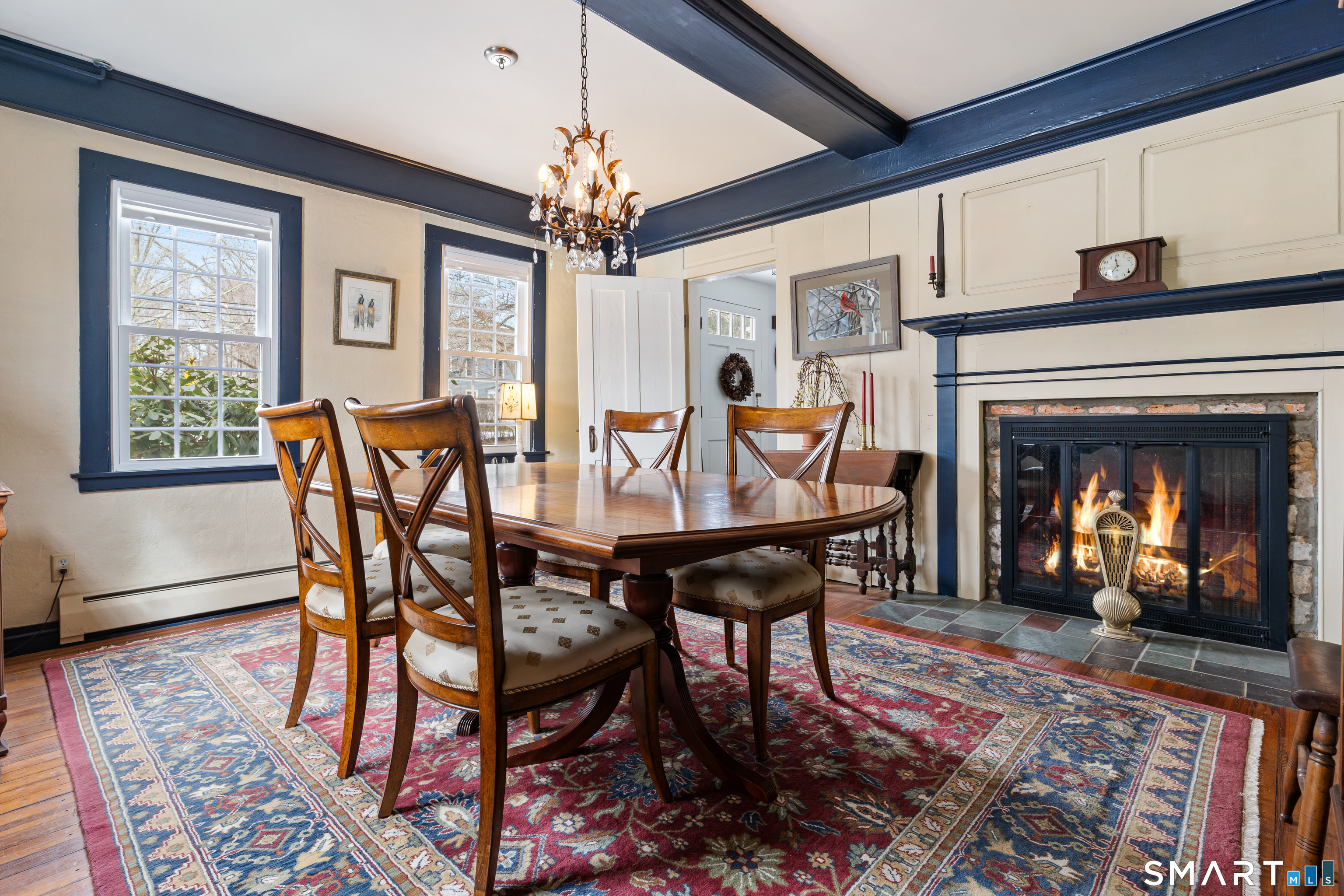147 Boston Street Guilford, CT 06437 - Photo 17 of 38 a view of a dining room with furniture window and wooden floor