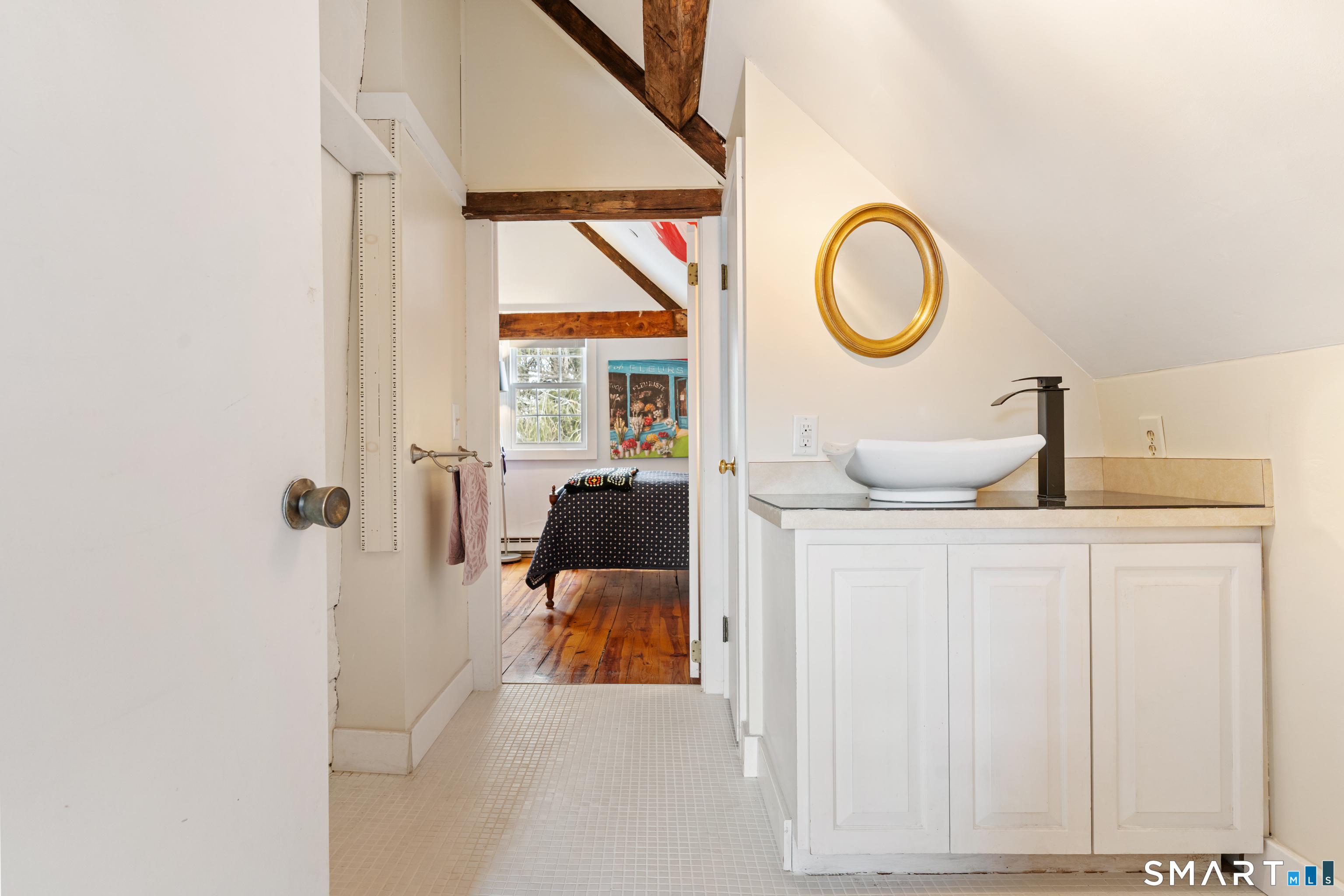 147 Boston Street Guilford, CT 06437 - Photo 20 of 32 a living room with furniture and a window