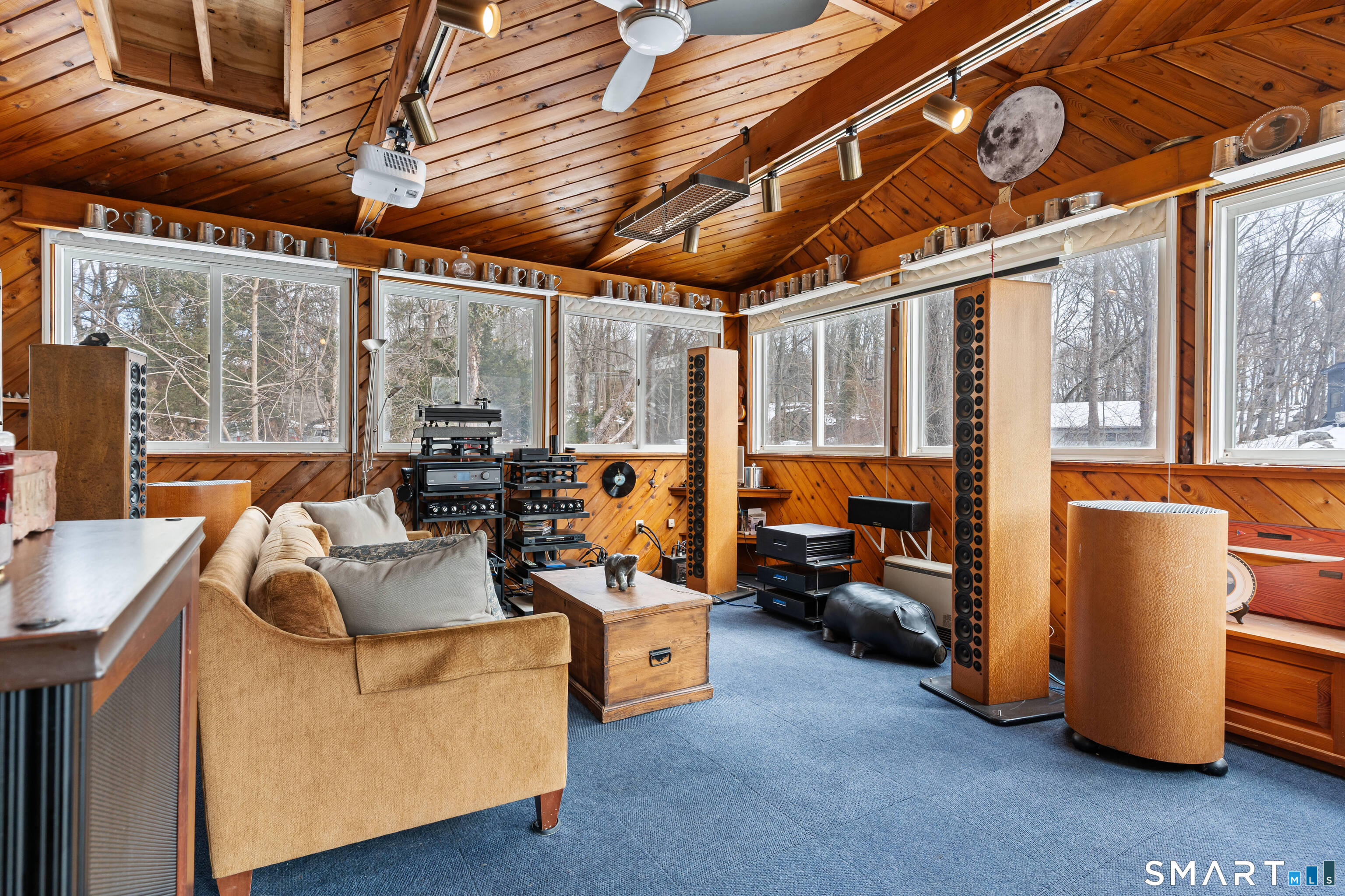 147 Boston Street Guilford, CT 06437 - Photo 26 of 32 a living room with furniture next to a large window