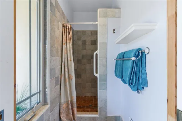 a view of a porch with a bench