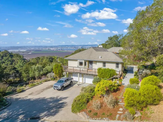 a view of a house with a garden