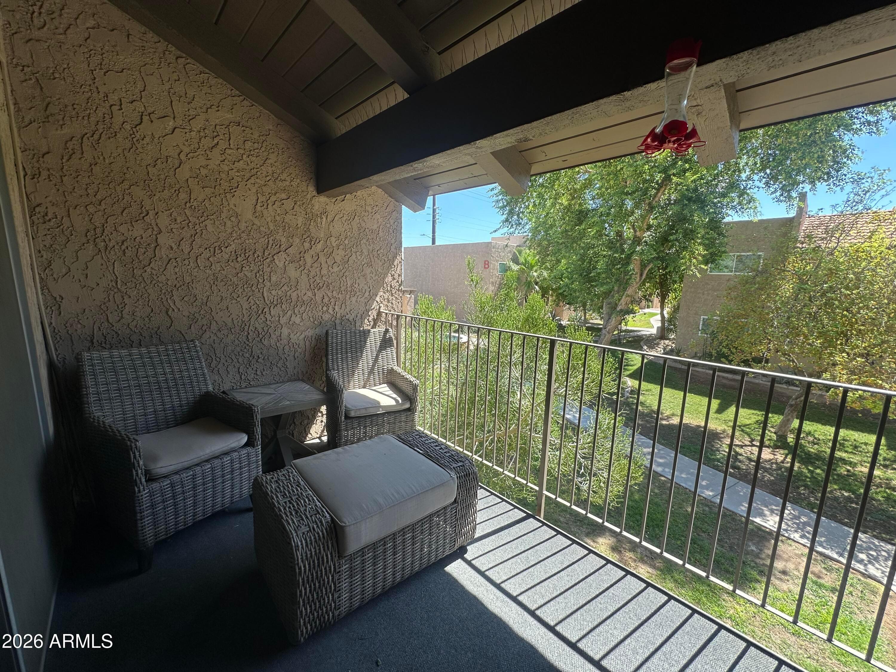 5525 East Thomas Road, Unit R8 Phoenix, AZ 85018 - Photo 17 of 21 a view of a balcony with chairs