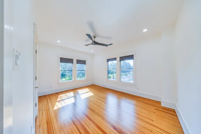 a view of walk in closet with empty racks
