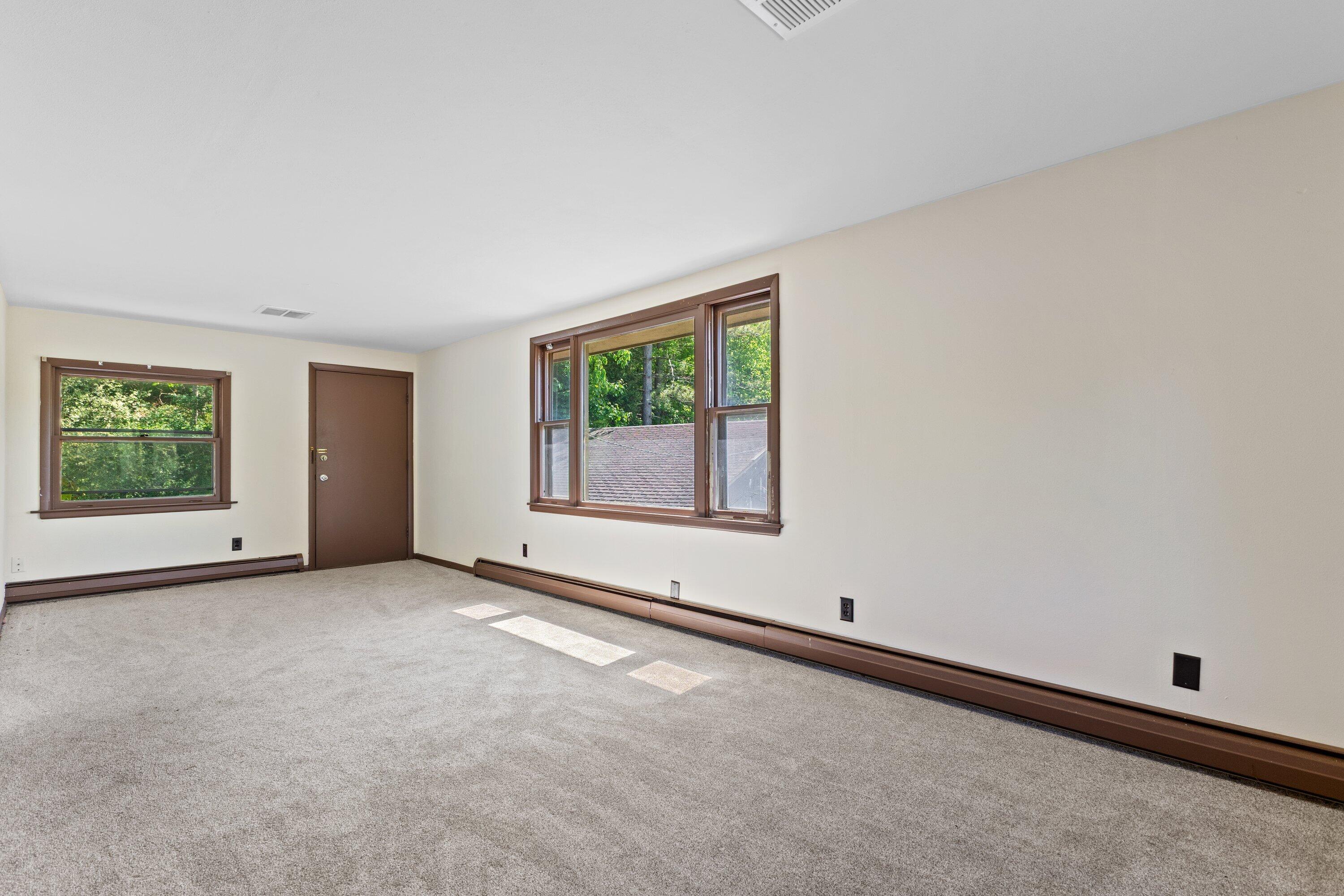 1380 Friess Lake Road Richfield, WI 53033 - Photo 36 of 47 large sunny living room