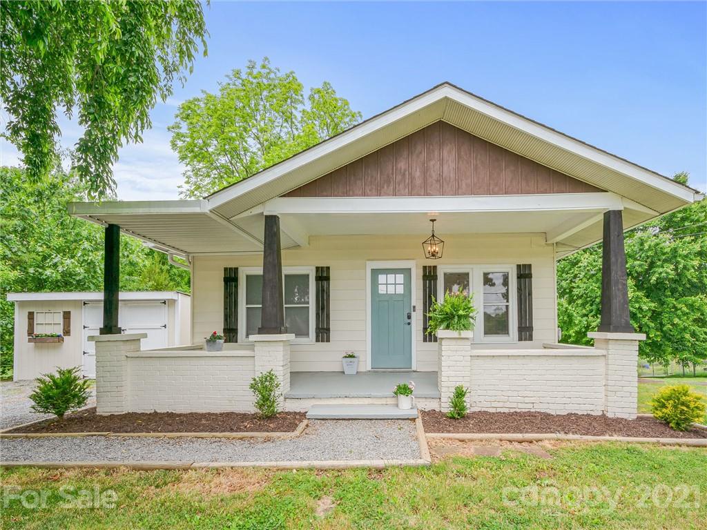 714 Queentown Road Canton, NC 28716 - Photo 1 of 21 a view of a house with a yard