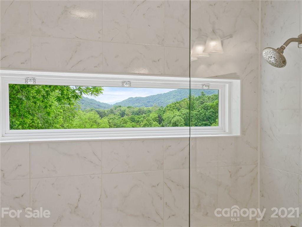 714 Queentown Road Canton, NC 28716 - Photo 11 of 21 a view of a wooden floor and a window