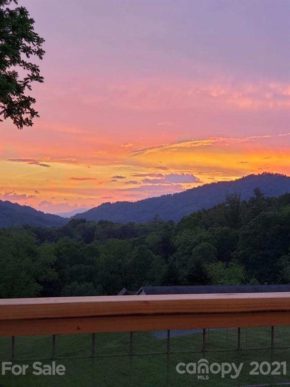 714 Queentown Road Canton, NC 28716 - Photo 21 of 21 a view of mountain with sunset in background