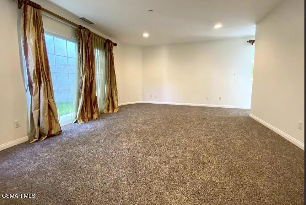 4130 Carrizal Road Woodland Hills, CA 91364 - Photo 16 of 33 an empty room with a window