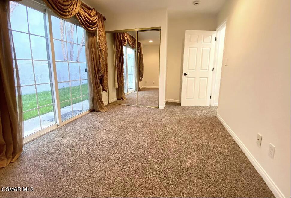 4130 Carrizal Road Woodland Hills, CA 91364 - Photo 24 of 33 a view of an empty room with glass door