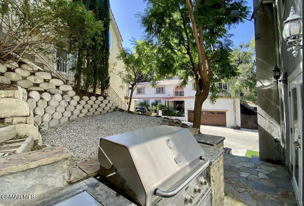 4130 Carrizal Road Woodland Hills, CA 91364 - Photo 30 of 33 swimming pool view with a seating space