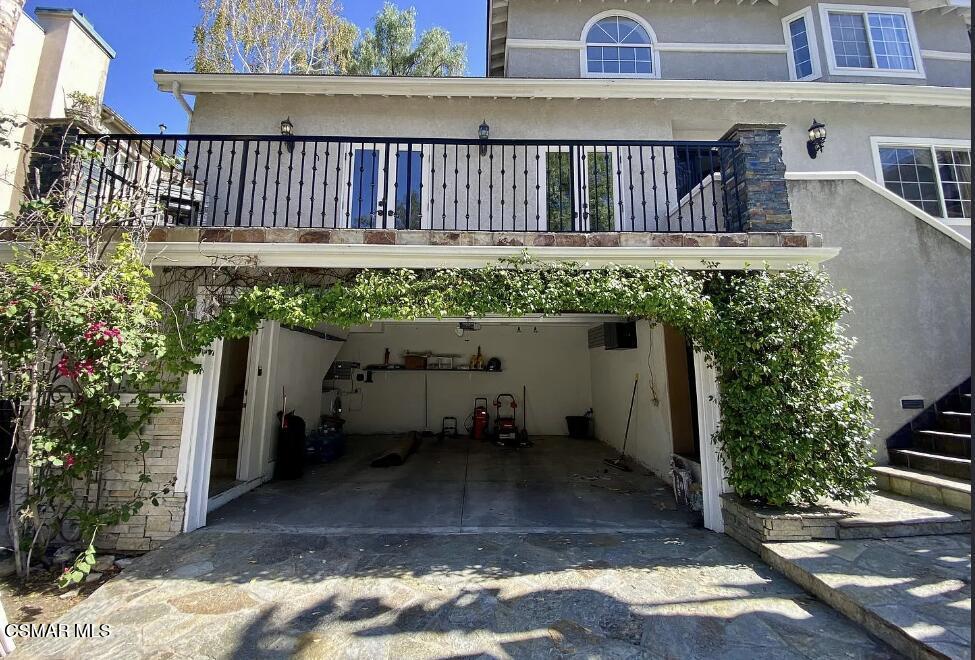 4130 Carrizal Road Woodland Hills, CA 91364 - Photo 33 of 33 a backyard of a house with a yard fire pit and outdoor seating