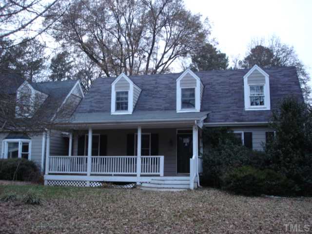 2807 Anderson Drive Raleigh, NC 27608 - Photo 1 of 15 a front view of a house with a garden