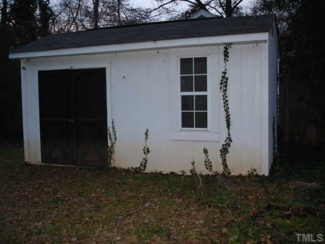 2807 Anderson Drive Raleigh, NC 27608 - Photo 15 of 15 a house with trees in the background