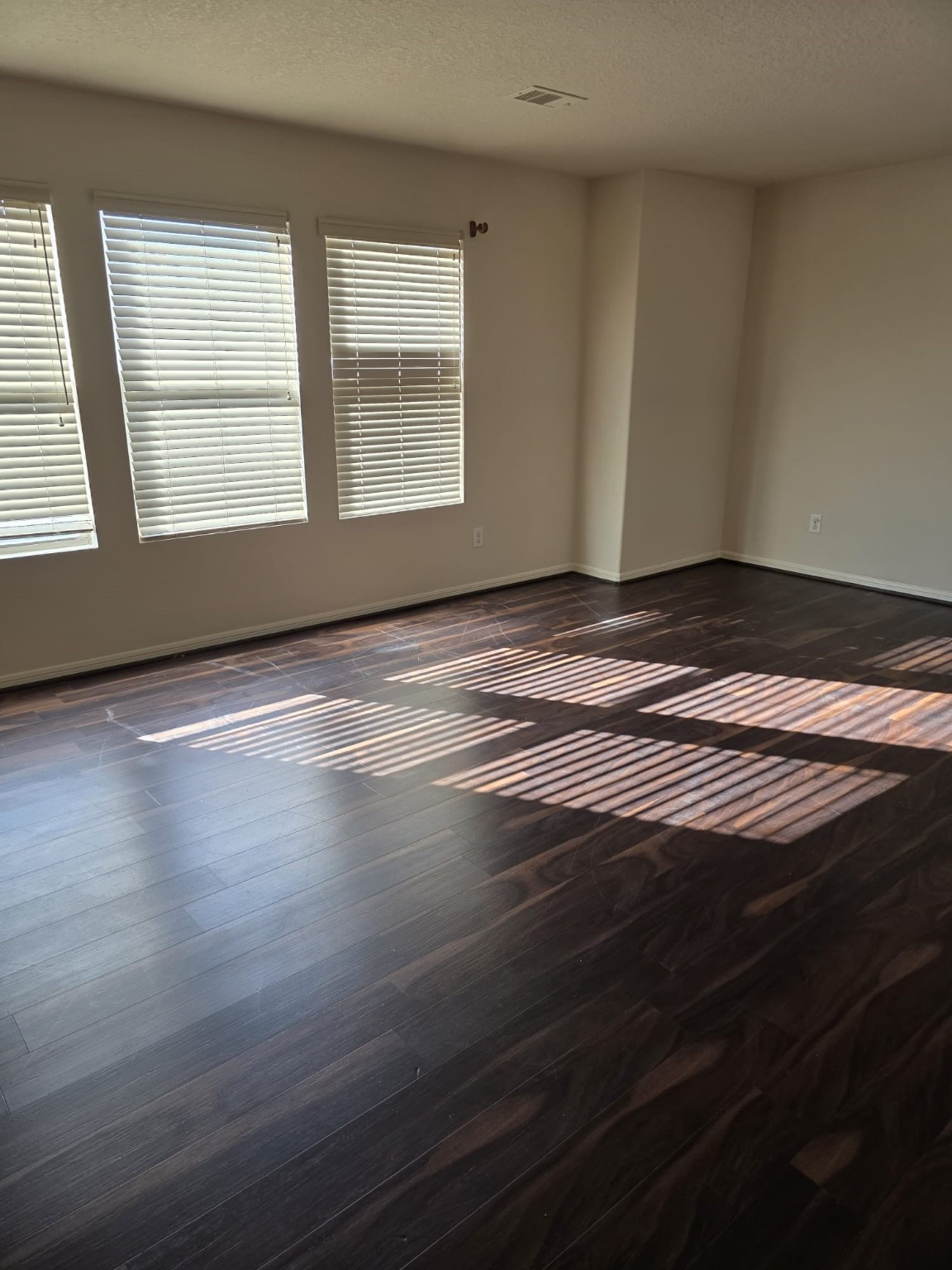 1023 Orie Court Spring, TX 77373 - Photo 14 of 28 a view of wooden floor and windows in a room