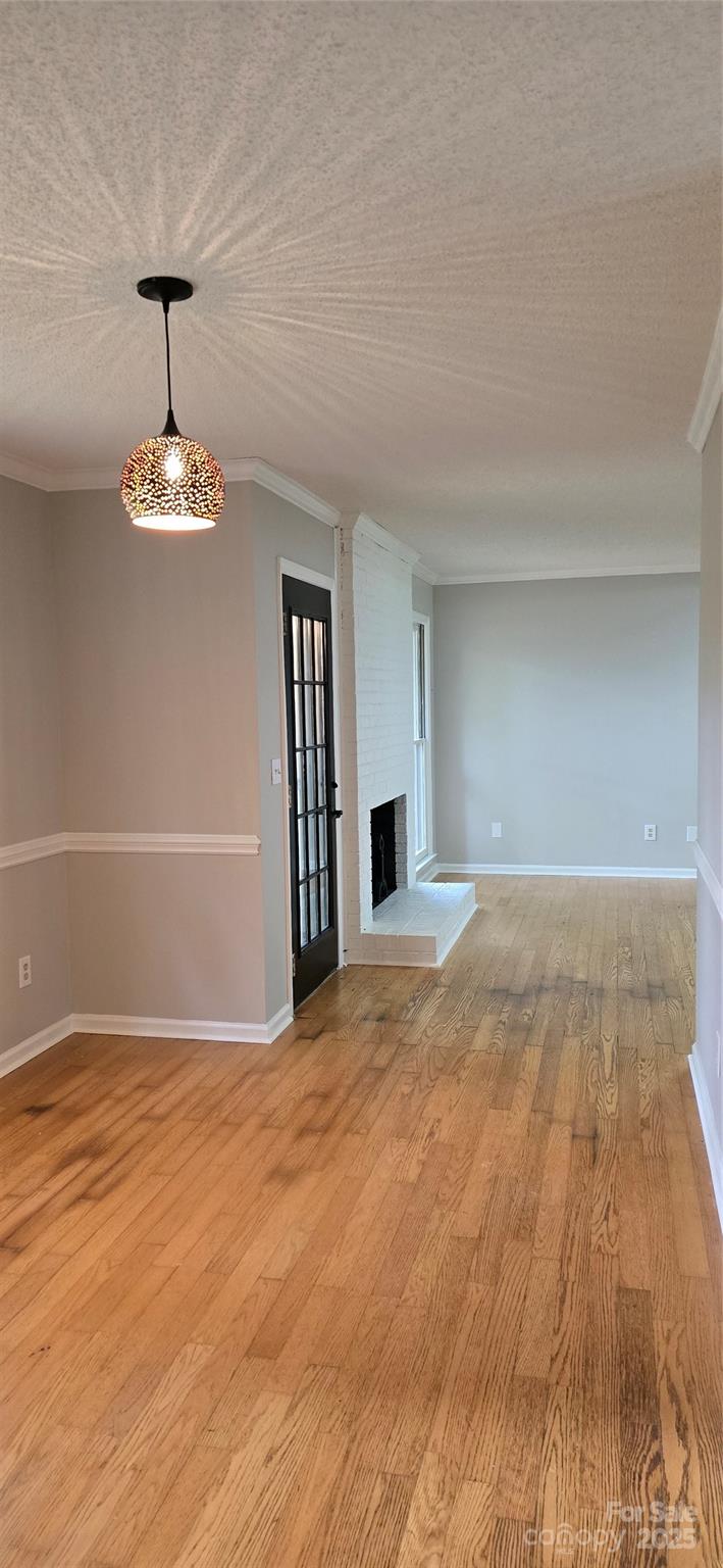 413 Parallel Drive Harrisburg, NC 28075 - Photo 14 of 40 a view of a livingroom with a chandelier