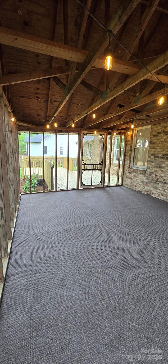 413 Parallel Drive Harrisburg, NC 28075 - Photo 34 of 40 a view of an empty room with a windows