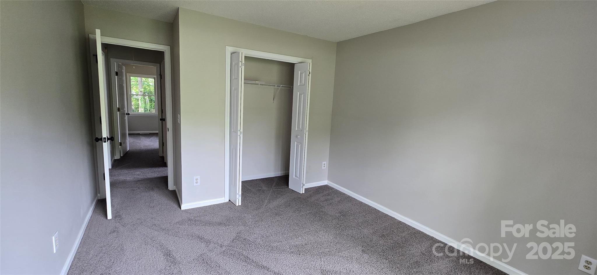 413 Parallel Drive Harrisburg, NC 28075 - Photo 8 of 40 an empty room with closet